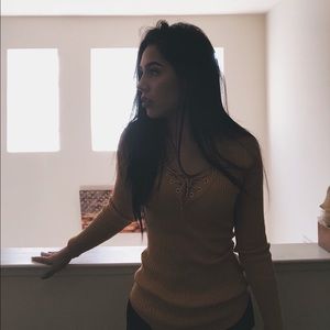 mustard colored long sleeve